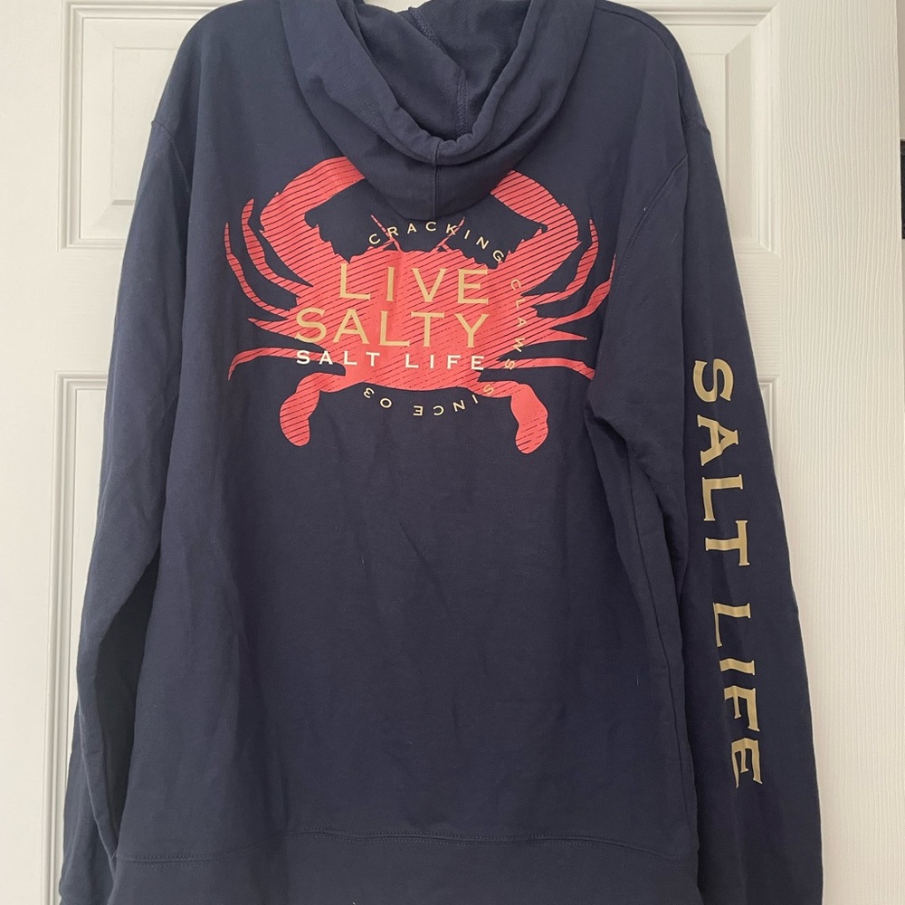Salt Life Navy Blue Hooded Sweatshirt with Crab on back, Gold Text Details